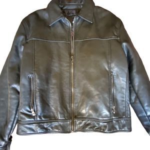 Vintage quilted Black Leather jacket. Made in Italy